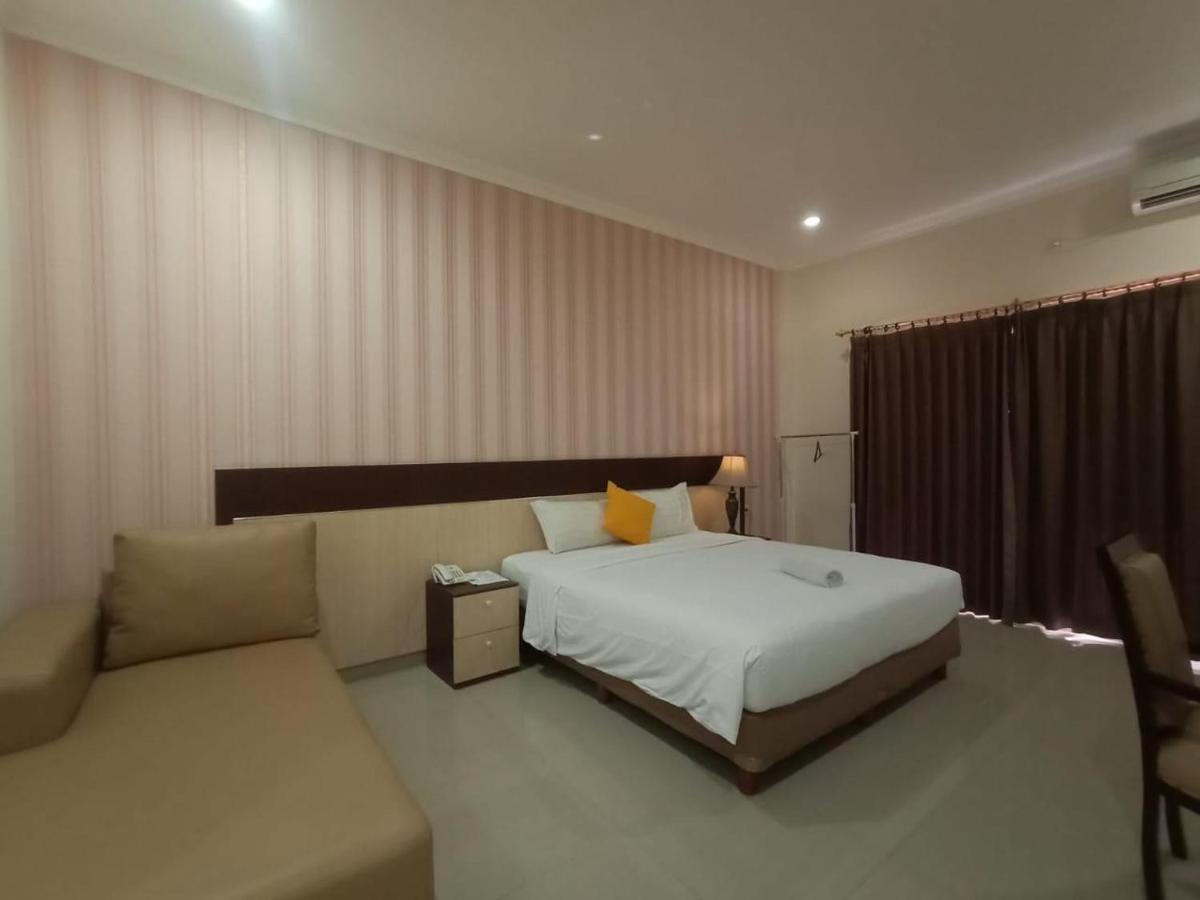Oyo 90473 Gowin Hotel Kuta  Exterior photo